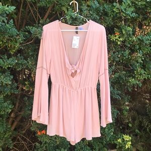 Light pink flared arm romper